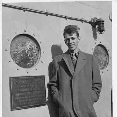 Man next to SS Alden Gifford plaque