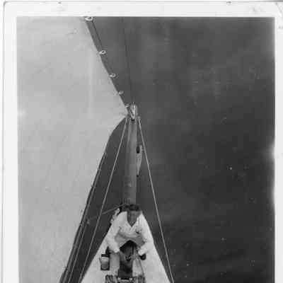 Man sitting on bowsprit of Adventure 1936