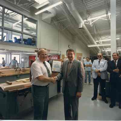 Two men shaking hands 7/26/1989