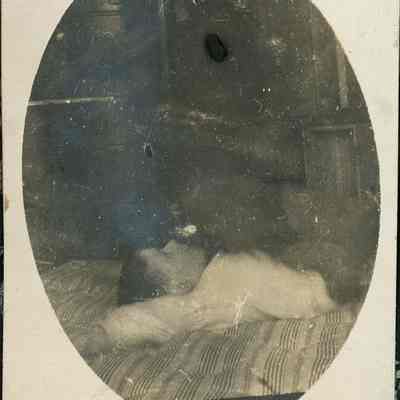 Boy laying on bed