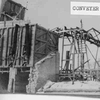 Stone quarry conveyor to storage bins