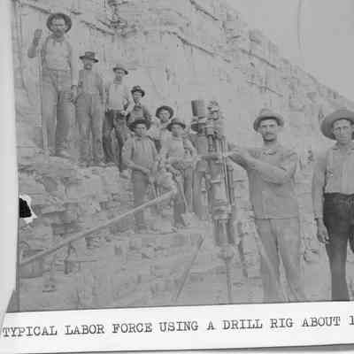 Stone quarry typical labor force using a drill rig around 1900