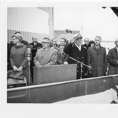 Group of people standing at the Alcoa Seaprobe christening podium