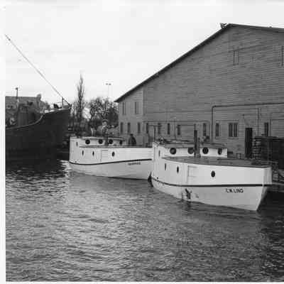 Lucky Star, Skipper, and C.W. Lind docked at SBSB&DD Co.