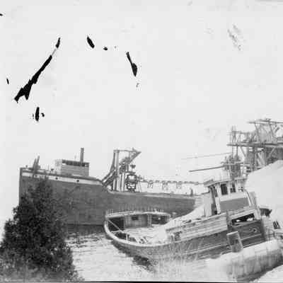 Ships alongside loading dock