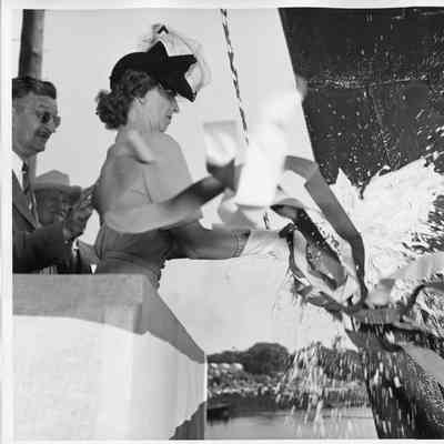 Mrs. Gus Johnson christening PF-64 USS Knoxville