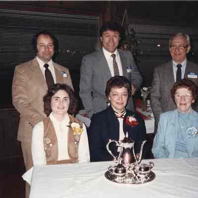 Three couples at dinner table