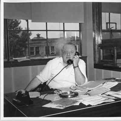 L.D. Brower Jr. at desk
