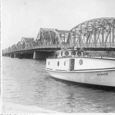 Fishing tug Ranger docked at Sturgeon Bay Boat Works with Michigan Street Bridge in background