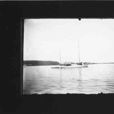 Unidentified two-maste vessel in middle of water