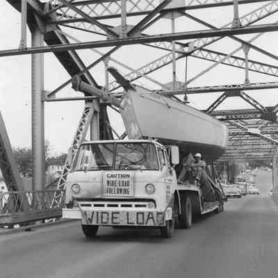 Vesel WS3919AH being transported by truck across Michigan Street Bridge