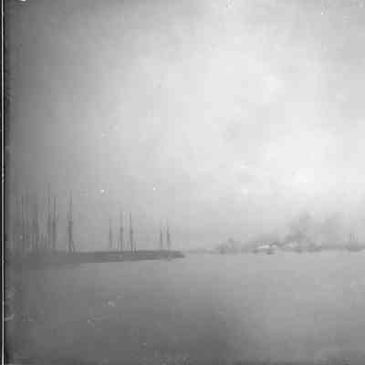 Unidentified masted vessels in water