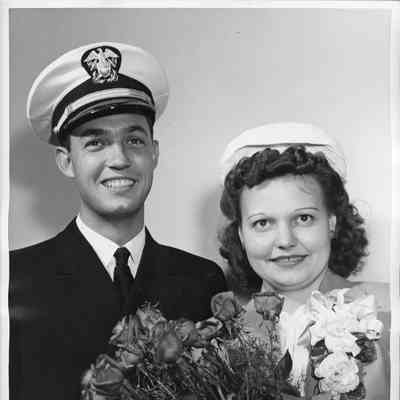 Betty Lau and Ensign E. Les Williams at christening of PC-1171 1943