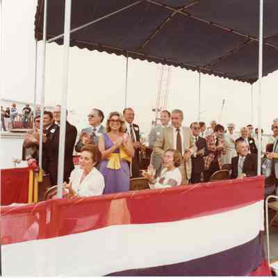 Crowd under canopy at christening of Napolean