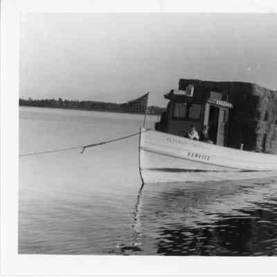 Service being towed with a load of hay on board