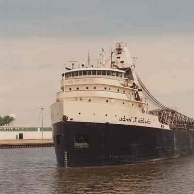 JOHN J. BOLAND