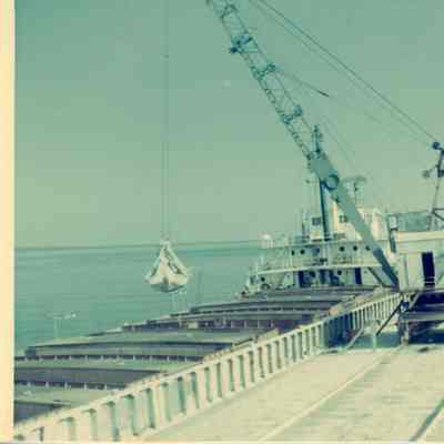 E.G. Grace aground Soo River while barge Maitland removes load 1969