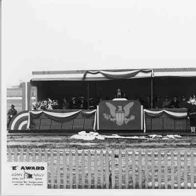 Army/Navy E award with man giving speech at SBSB&DD Co. April 20, 1944