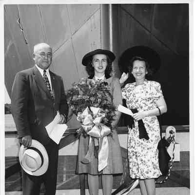 Alva Smith, Leathem D. Smith, and ship sponsor at christening of AK-207 USS Richland