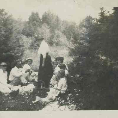 group seated at a picnic
