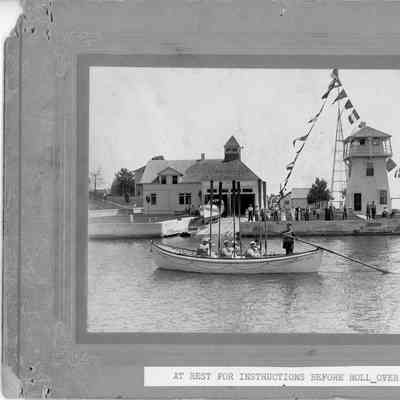 Coast Guard in boat before roll over test at Sturgeon Bay Canal Station 1919