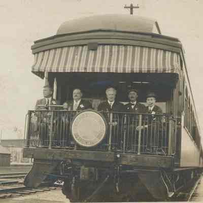 Five men in rear of train