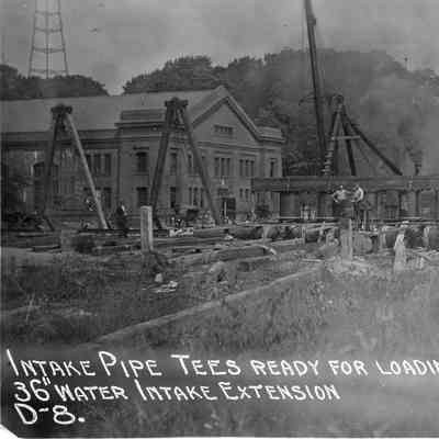 Intake pipe tees loaded on scow September 9, 1925