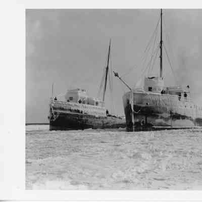 City of Naples and another vessel covered with ice in icy/snow covered water