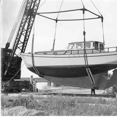 Palmer Johnson Yacht being hoisted by crane