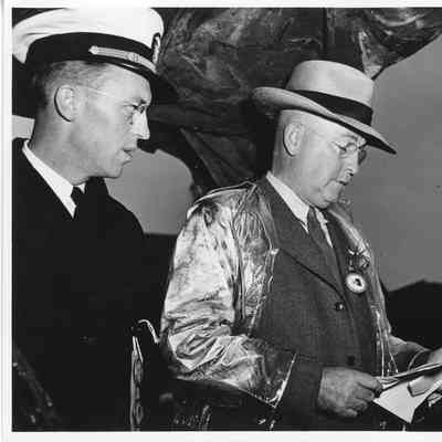 L.D. Smith with speech in hand at PC-1225 ship christening