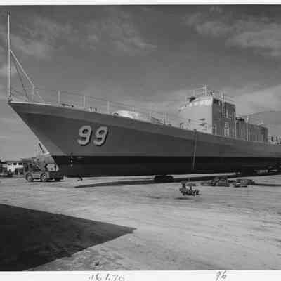 PG-99 USS Beacon being towed in shipyard
