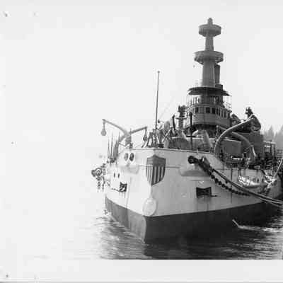 "Starts and Stripes" shield on bow of docked vessel