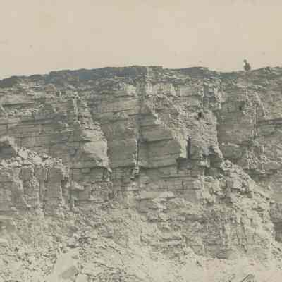 Workers on top of quarry