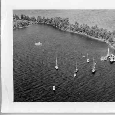 ten sailing vessels close to shore