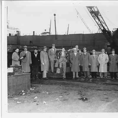 C. Ray Christianson with 14 men near LST-291-1 1951