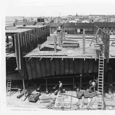Hull of Badger under construction August 1, 1951