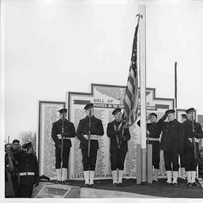 US Coat Guard color guard standing in fornt of L.D. Smith Sign