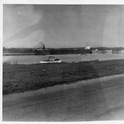 Steamer going through canal