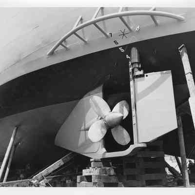 Port side propeller and rudder of LST-1170, May 22, 1954