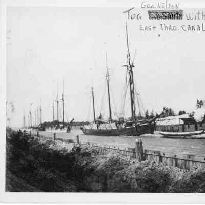 Geo. Nelson towing schooners through the Sturgeon Bay Ship Canal