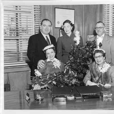 Joan and Joseph Mcarthy with C. Ray Christianson during christening of LST-1170 May 22, 1954