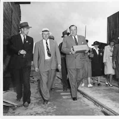 Elton Washburn, C. Ray Christianson, and Unidentified man