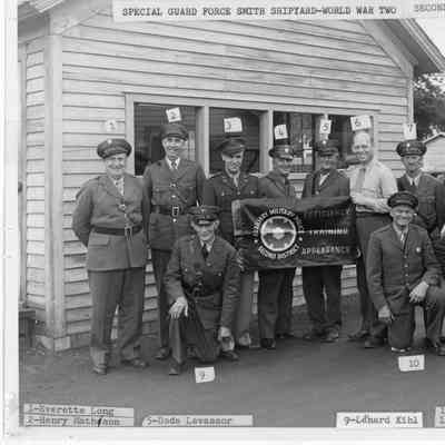 Special Guard force Smith Shipyard holding banner