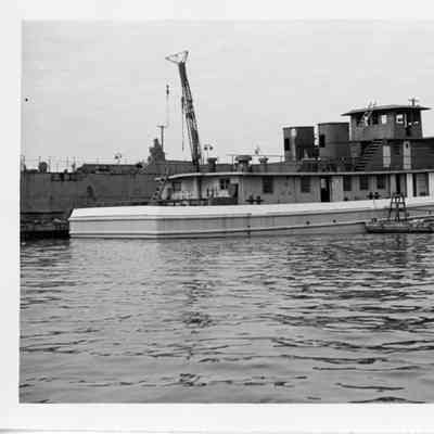Barge tug at shore