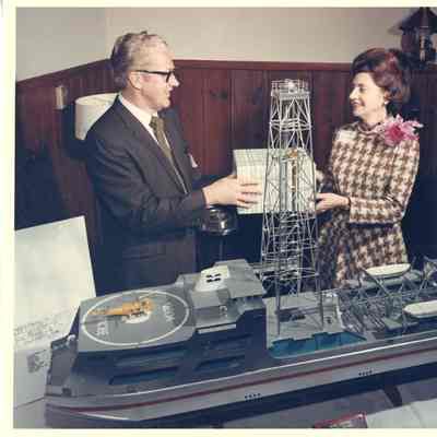 Bob Peterson giving Mrs. Woodward a present at Alcoa Seaprobe christening