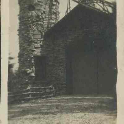 Garage and tower of Hotz Home