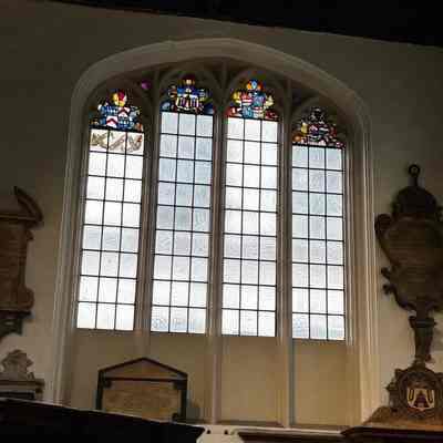 The Tomb of John Stow (lower right) and Stained Glass of the Company Arms (upper left): Reproduced with permission from St. Andrew Undershaft