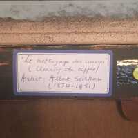          label, verso of painting attached to upper portion of stretcher bar
   