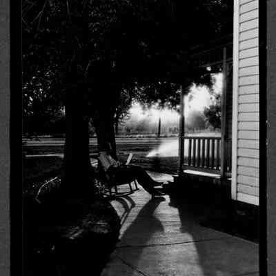 Gleason Sitting on Porch