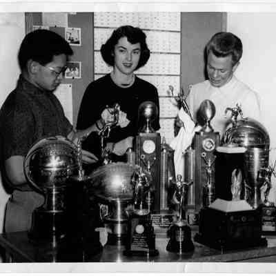 DHS Students Cleaning Trophies
